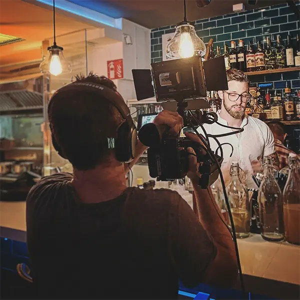 James being filmed at his bar